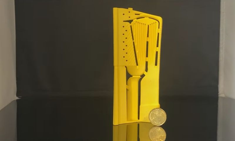 a yellow model printed on the 3DCeram C1000 FLEXMATIC
