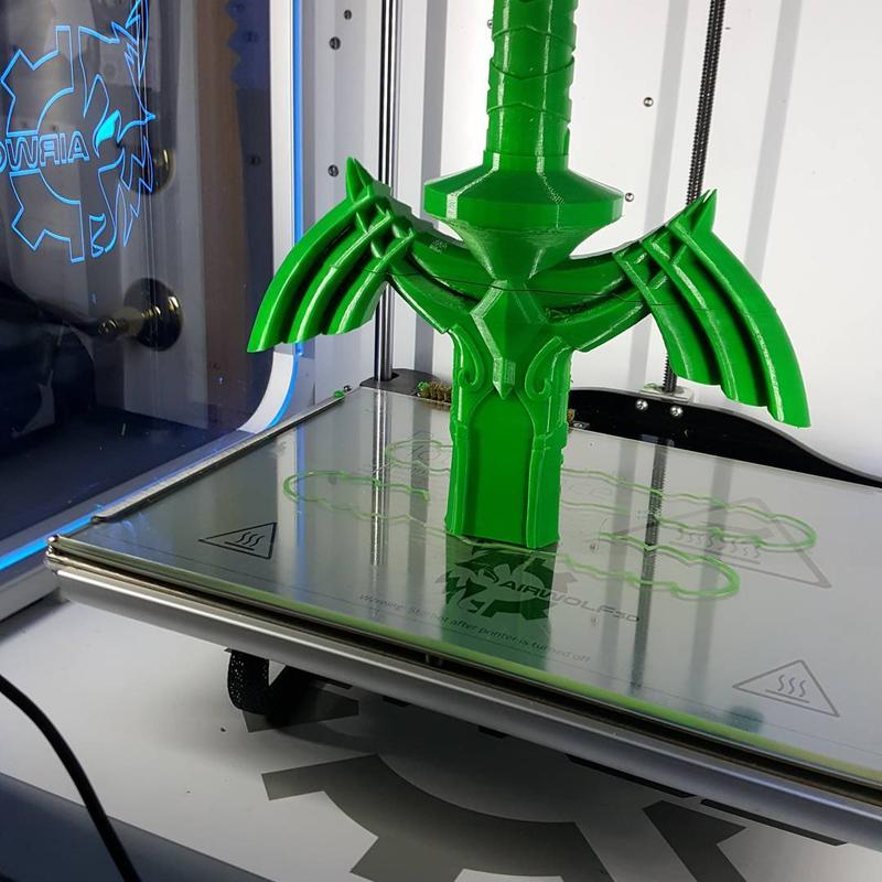 One user pictured the first 3D printing session of a Zelda Master sword. The pic shows two overlapping parts