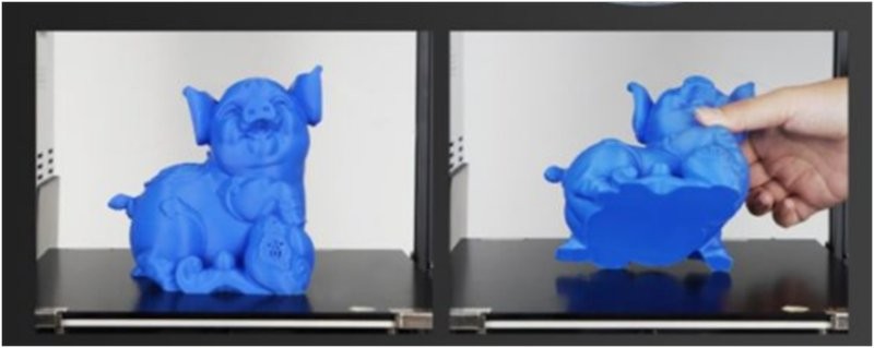 a blue model pig printed on the Anycubic Mega SE