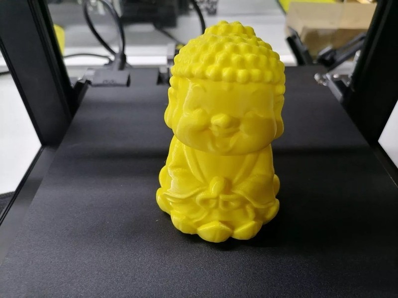 a yellow model printed on the 