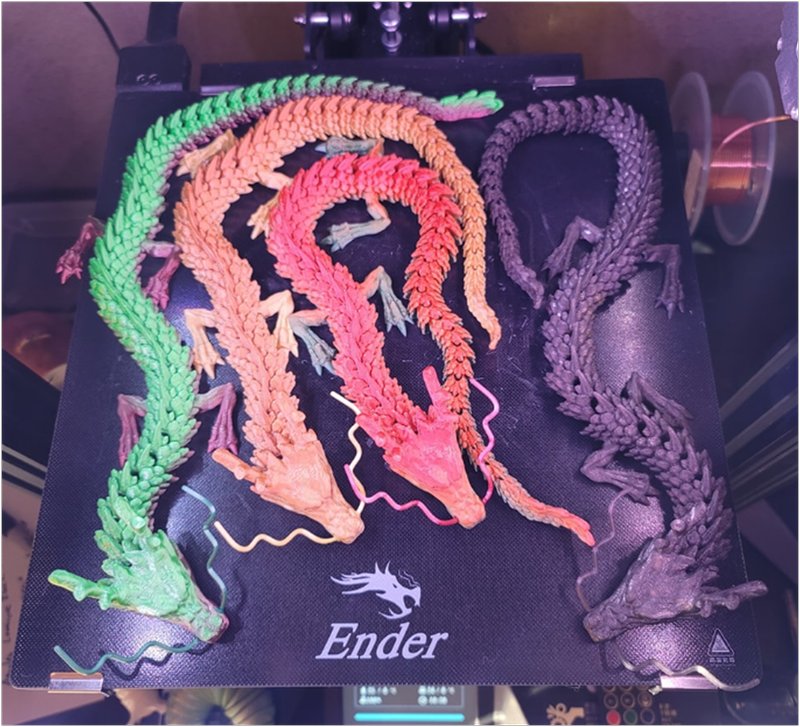 a different colors dragons printed on the Creality Ender 7