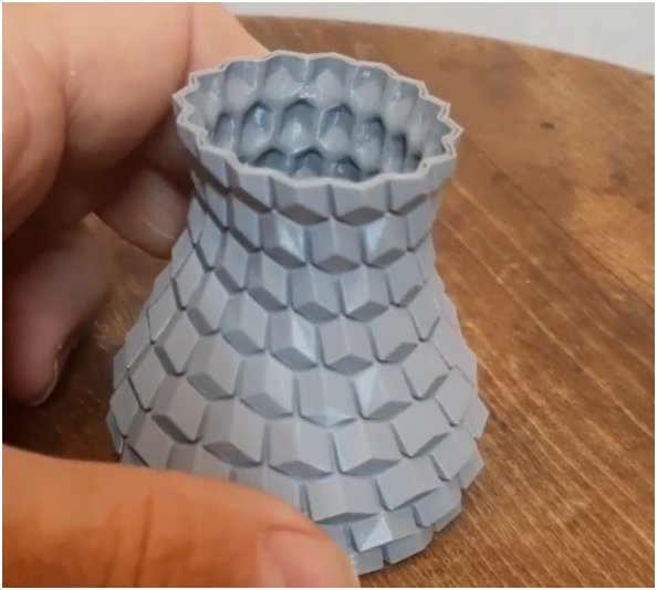 A gray vase printed on the Flashforge Adventurer 3 Pro 3D printer