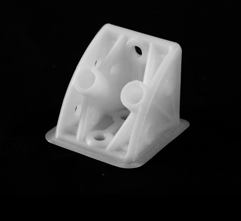 The cooling system has been designed to reduce warping and stringing. It generally makes for higher quality prints. 