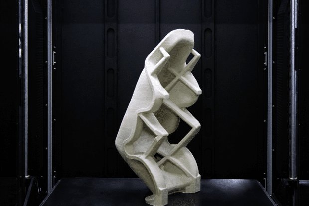 a white model printed on the Massivit 10000 3D printer