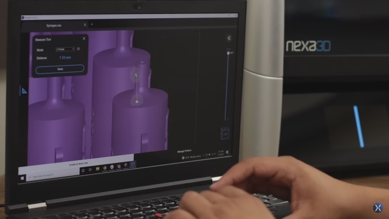 a NexaX 2.3 Basic and NexaX 2.3 Pro software on the Nexa3D XiP 3D printer