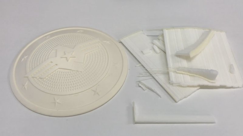 a white model shield printed on the Omni3D Factory 2.0 3D printer 