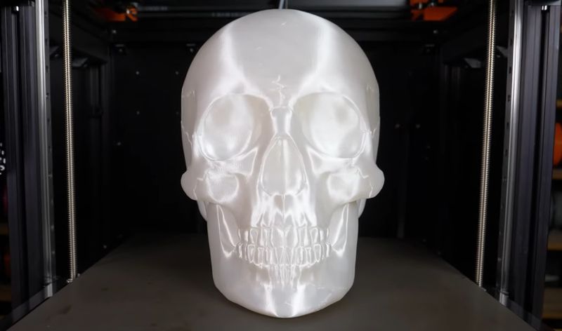 a white model skull printed on the Original Prusa XL 3D Printer