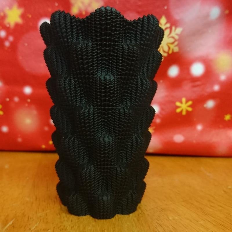 a sine cube vase with black PLA