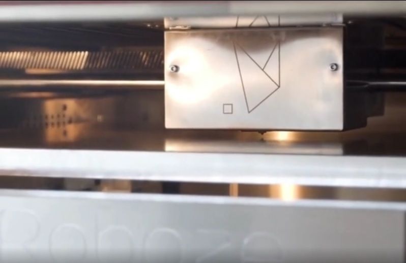 A close-up view on the printing process by the Roboze ARGO 350 3D printer.