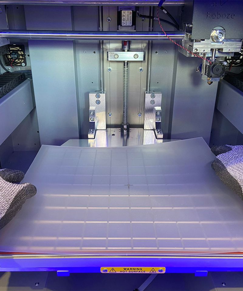 The print bed of the Roboze Plus PRO 3D printer.