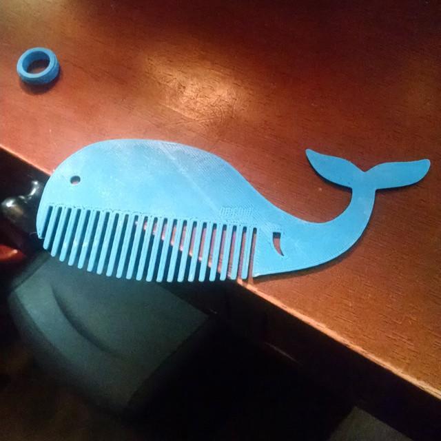 whale-shaped comb as Christmas gift. Look at its teeth.