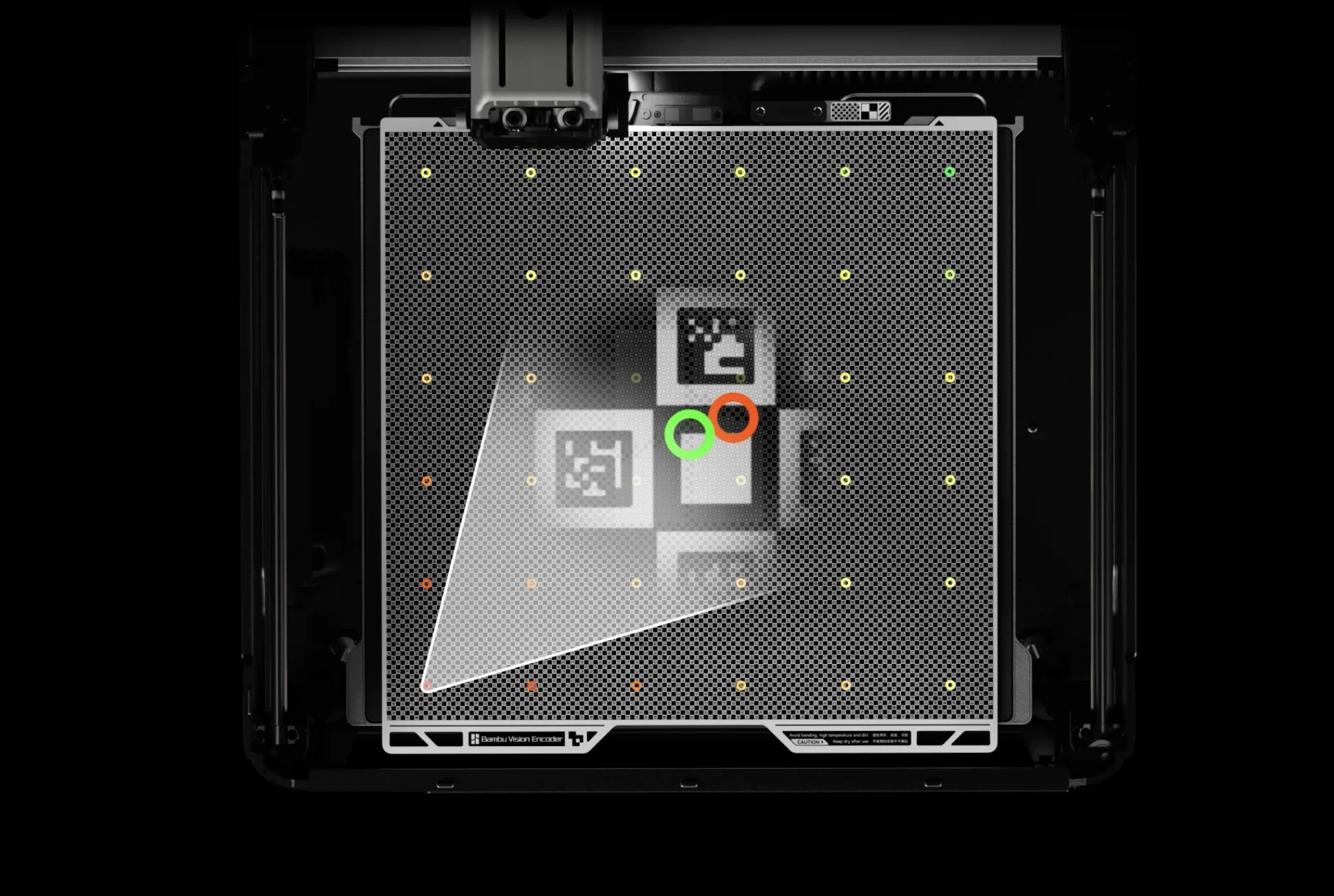 Bambu H2D 3D printer with a grid of QR codes and colored markers on the print bed, showing precision alignment for accurate part creation.