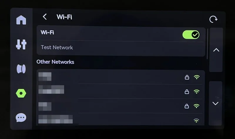 Touchscreen showing Wi-Fi settings on a Bambu H2D 3D printer interface, listing available networks with connection status indicators.