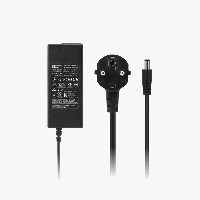 Bambu H2D power adapter and cable set, black, with EU plug, technical specifications visible on adapter, clear background.