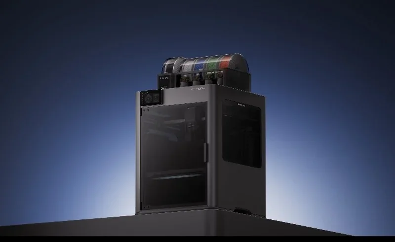 Bambu Lab H2D Pro 3D printer on a dark gradient background, showcasing multiple filament spools on top.