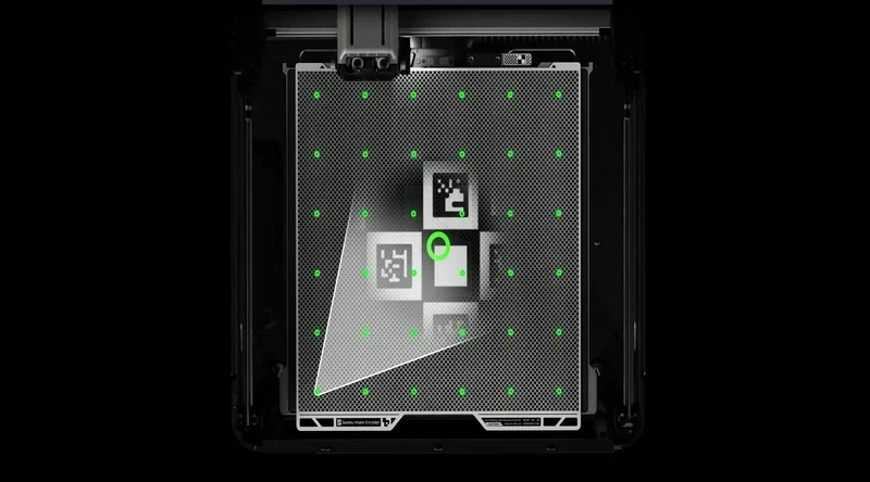 Bambu Lab H2S 3D printer platform with QR codes and green calibration dots, showcasing precision for accurate printing.