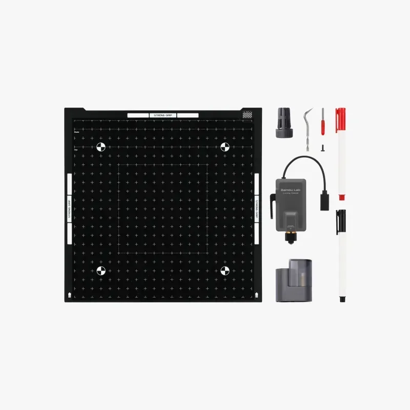 Bambu Lab H2S 3D printer accessories, including a black grid build plate, spare nozzle, tools, USB cable, and pen, are neatly arranged against a white background.