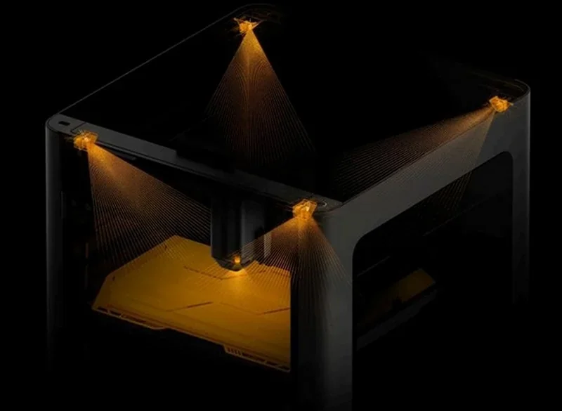 Bambu Lab H2S 3D printer showcasing laser calibration beams illuminating from corners, highlighting precise printing surface setup.