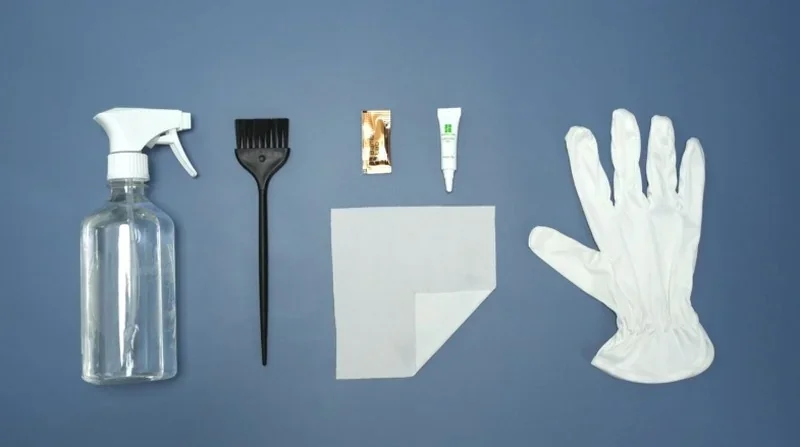 Spray bottle, hair brush, foil packet, tube, cloth, and glove on blue background. Tools likely used with Bambu Lab H2S 3D printer for post-processing.