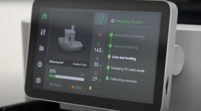Bambu Lab X1 3D Printer touchscreen displaying a print progress interface with a 3D model preview, status updates, and settings.