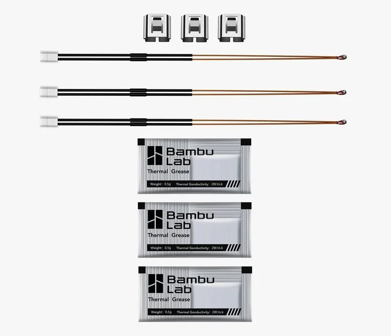Bambu Lab X1 thermal grease packs with three heatpipes and fittings for efficient 3D printing. Branding visible, arranged on a white background.