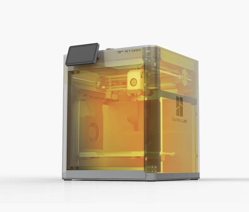 Bambu Lab X1 3D printer with transparent yellow casing, showcasing interior components. Branding visible on the side, indicating advanced design capabilities.