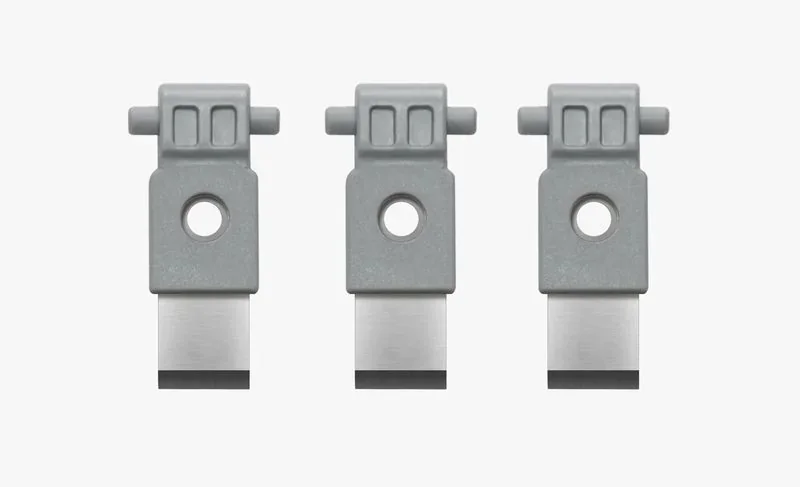 Three gray 3D-printed components with holes and rectangular bases, created by Bambu P1P, aligned against a white background.