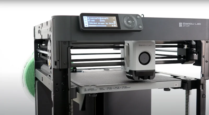 Bambu Lab P1P 3D printer with control panel, visible rails, and filament holder, showcasing printing area where parts can be created.