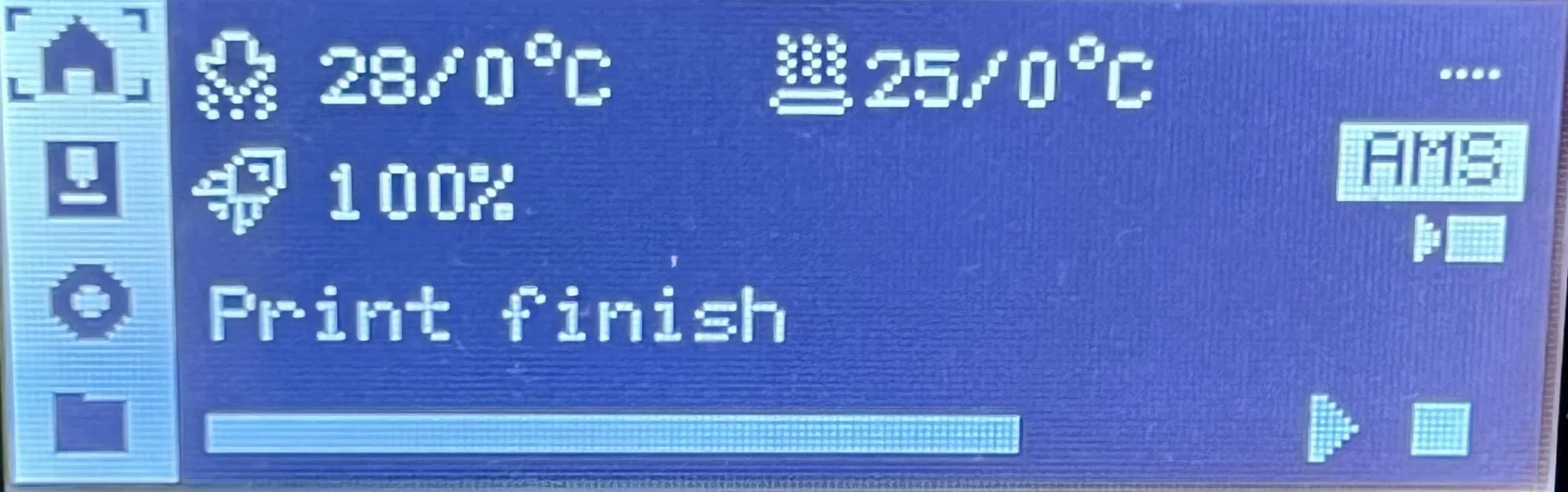 Bambu P1S screen shows print completion at 100%, with ambient and bed temperatures. Display features icons and progress bar.