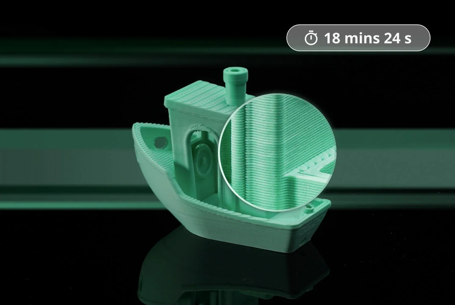 Green 3D-printed boat model by Bambu P1S, with a magnified view of layer detail, completed in 18 mins 24 secs, on a black background.