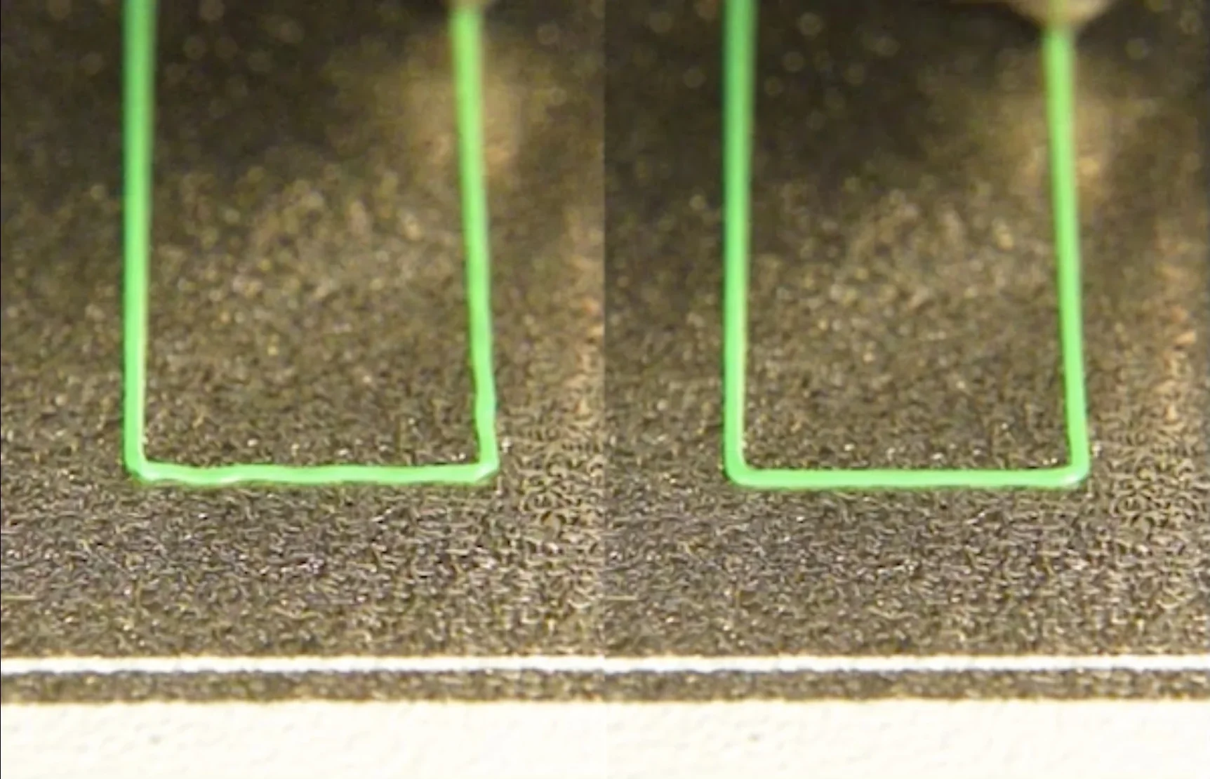 Close-up of green lines printed by Bambu P1S on a textured surface, showcasing precision and smoothness in 3D print quality.