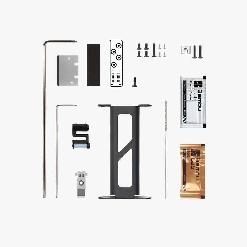 Bambu P1S printer parts kit including screws, brackets, rods, and branded packets, arranged neatly on a white background.