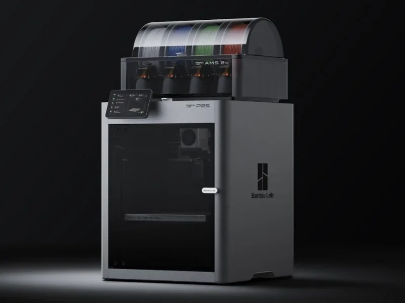Bambu Lab P2S 3D printer with multi-color filaments, sleek design, visible branding, and an attached control screen in a dark setting.