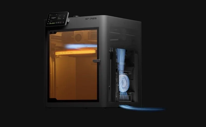 Bambu P2S 3D printer with transparent, illuminated chamber on black background, showing airflow design and internal components.