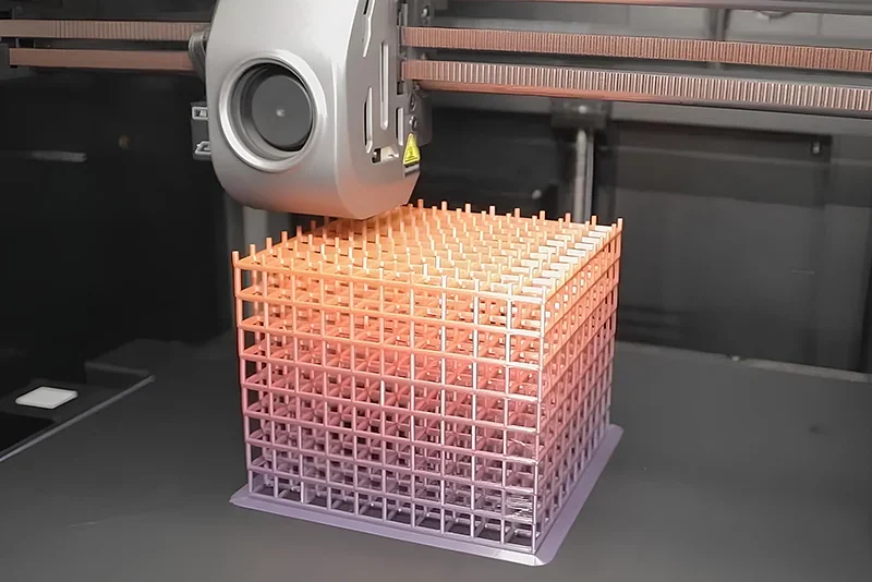 Creality K1 Max 3D printer creating a colorful lattice cube structure on a print bed.