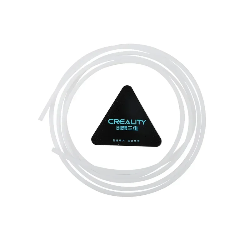 Creality K1 Max 3D printer part with a black triangular branding piece and coiled white filament.