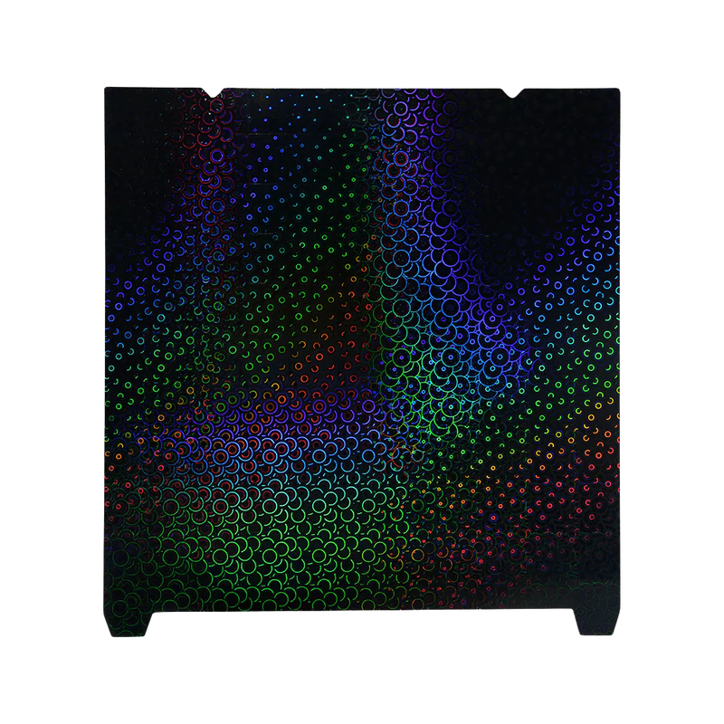 Colorful circle pattern on a black surface, possibly a print sample from the Creality K1 Max 3D printer, showcasing its precision and detail capabilities.