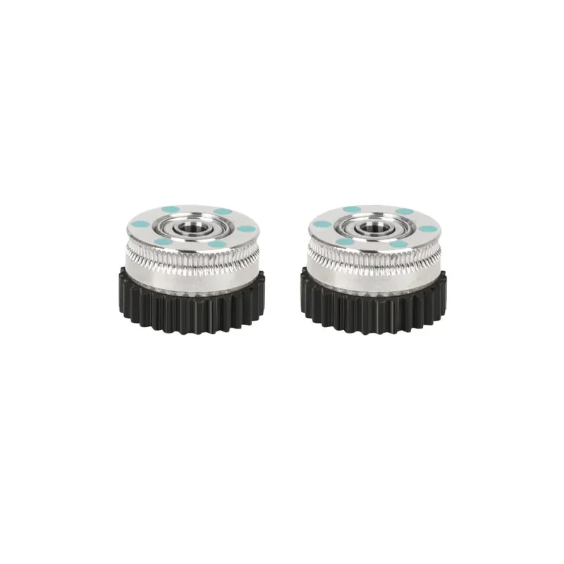 Creality K2 printer components; two metal gear wheels with black base and turquoise spots, likely manufactured by the Creality K2 3D printer.