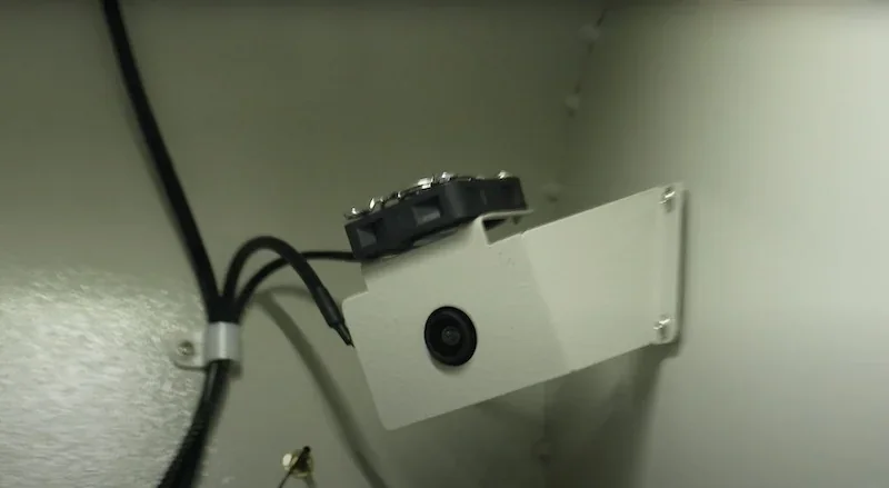 Camera and sensor inside Creatbot D1000 Pro HS 3D printer enclosure, showing internal wiring and components for monitoring print processes.