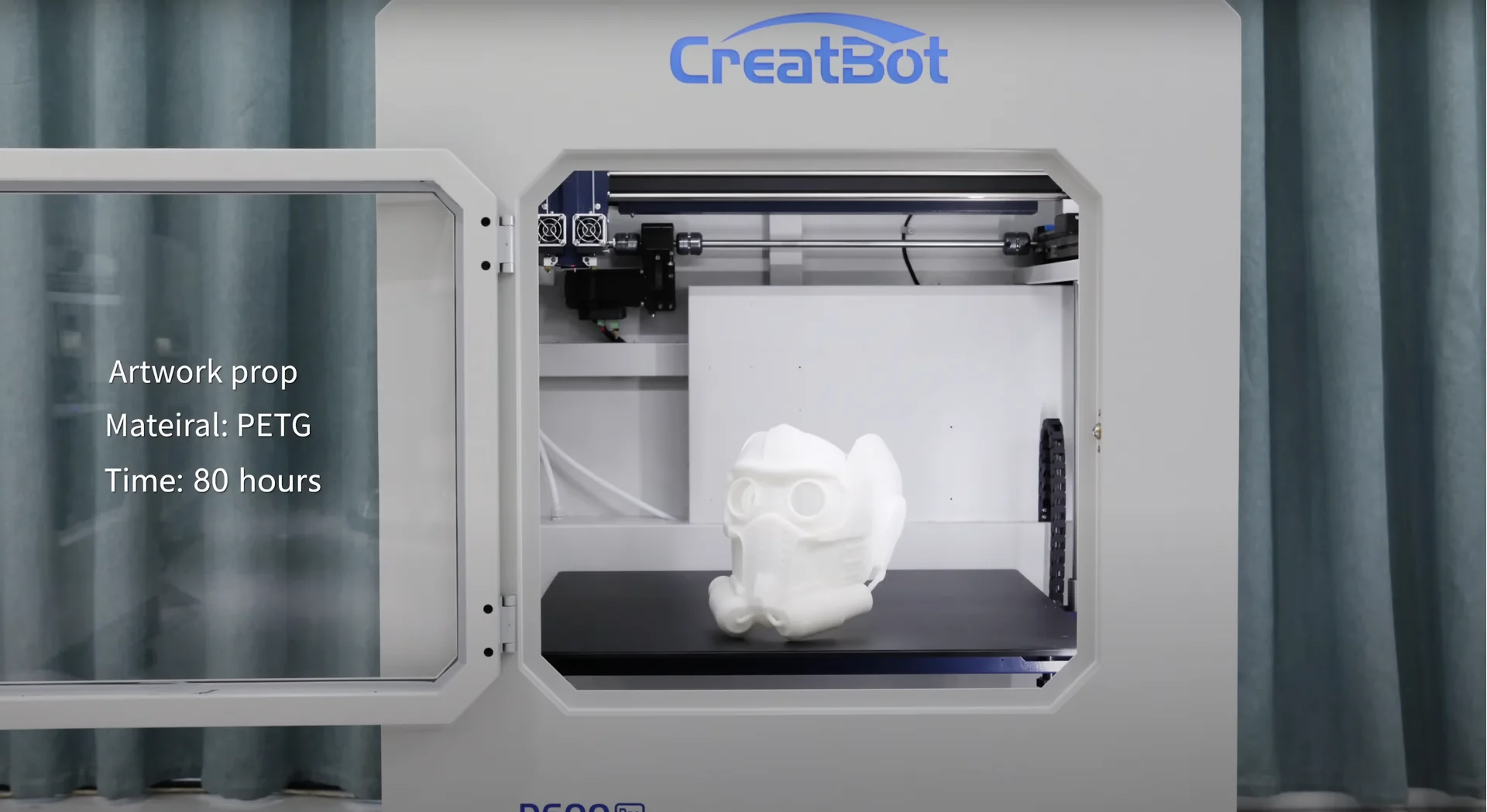 CreatBot D600 Pro printing white mask prop in PETG, 80 hours, inside open chamber with CreatBot logo visible above.