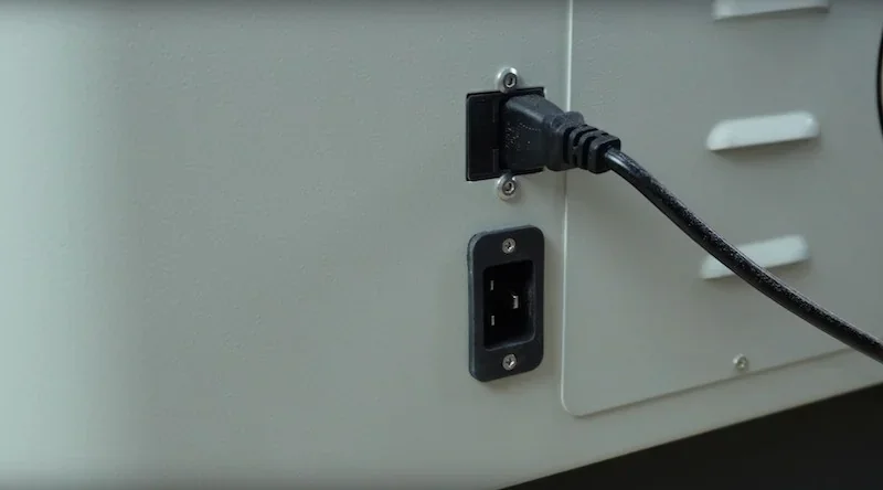 Power cable connection for creatbot d600 pro2 hs on the printer's back panel, highlighting features and technical design elements.