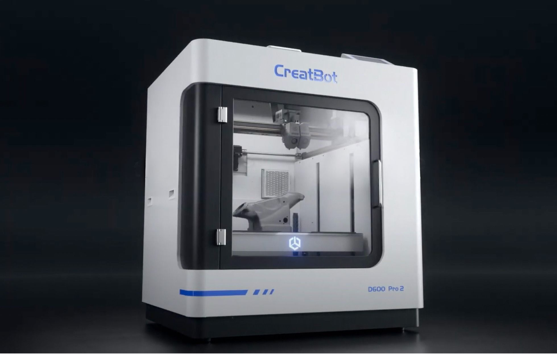 Creatbot D600 Pro2 HS 3D printer machine displayed, showcasing interior with printed object, stylish design, visible branding, on dark background.