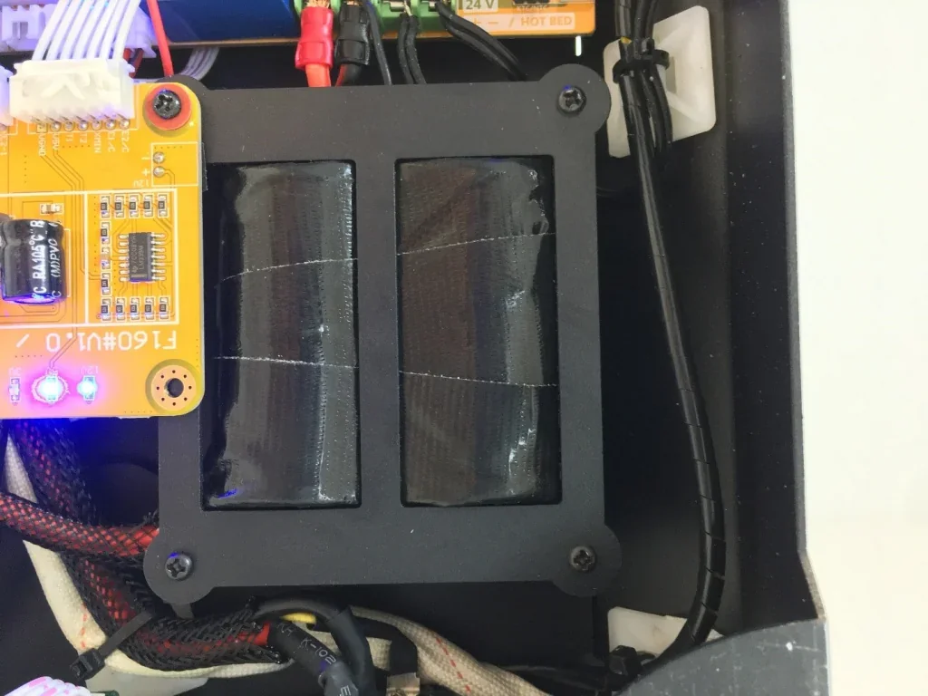Creatbot F160 internal wiring and electronics component, showing circuit board with LEDs and connector cables in a structured, compact layout.