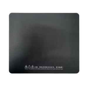 Flat black print bed labeled with caution symbols, used for the Creatbot F160 3D printer, emphasizing safety instructions.