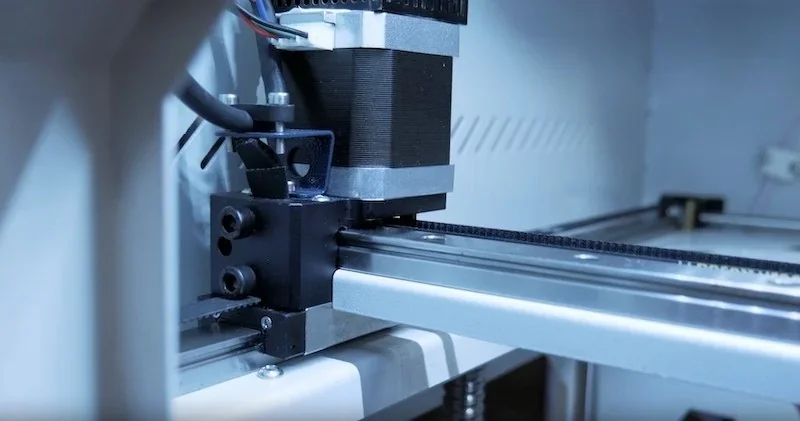 Creatbot F430 3D printer interior, showing motor, rails, and wiring details; emphasizes precision mechanics and technical design features.