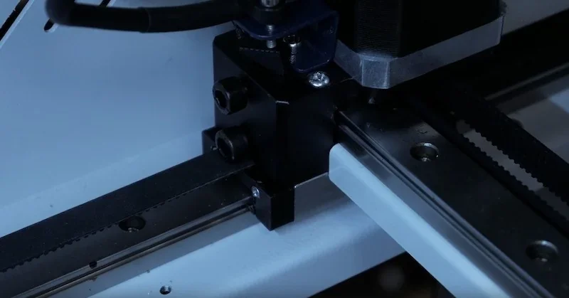 Creatbot F430 3D printer close-up shows a precision rail and nozzle assembly, indicating advanced mechanics and focus on detail creation.