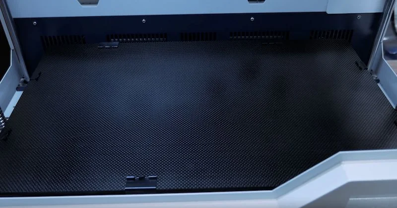 Creatbot F430 3D printer with an empty build plate, enclosed design, featuring a textured surface for precision printing and advanced material capability.