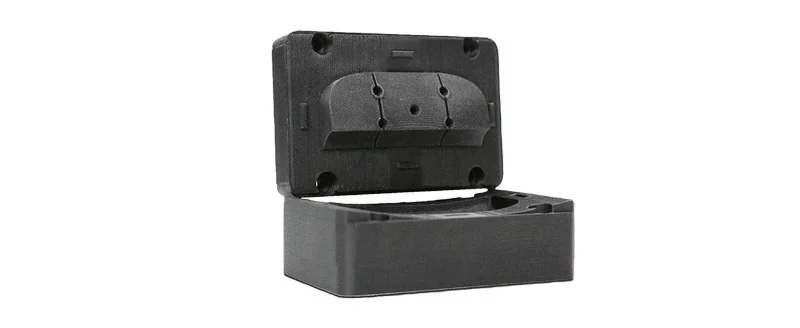 3D printed black plastic enclosure with open lid, produced by creatbot peek-250, designed for housing or storage purposes, with visible hinge details.