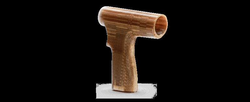 A 3D-printed part created by the CreatBot PEEK-250, showcasing a T-shaped handle with a smooth, layered texture. The part displays a wood-like finish, highlighting the printer's capability to work with advanced, durable materials suitable for functional prototypes and end-use components.