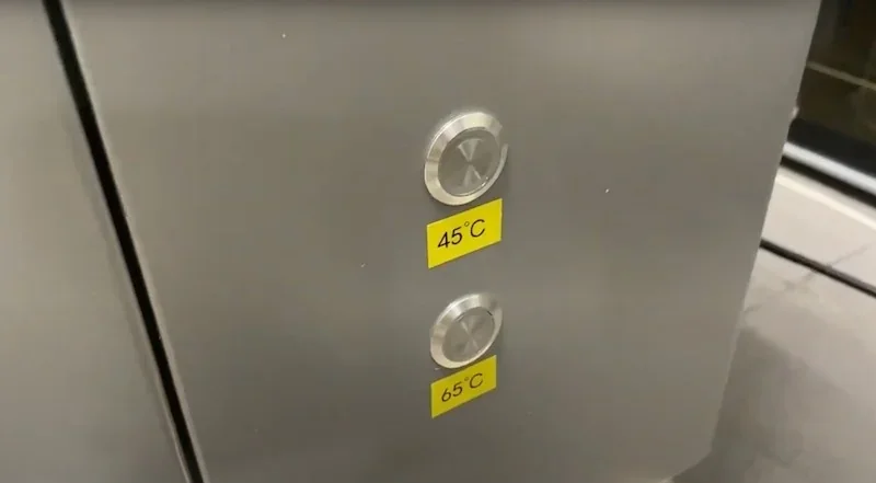 Creatbot PEEK-300 control panel with two metal buttons labeled 45°C and 65°C, part of the 3D printer's temperature settings.